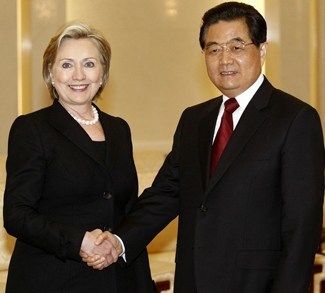 U.S. Secretary of State Hillary Clinton arrives to a meeting with Chinese President Hu Jintao in the Great Hall of the People in Beijing