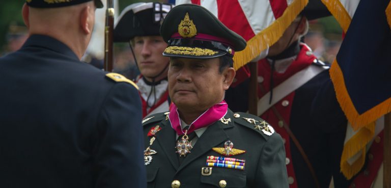 Commander-in-Chief of the Royal Thai Army Gen. Prayuth Chan-ocha, center, receives the Legion of Merit from Chief of Staff of the U.S. Army Gen. Ray Odierno during an Army full honors ceremony at Joint Base Myer-Henderson Hall in Arlington, Va., June 6, 2013. (U.S. Army photo by Staff Sgt. Teddy Wade/Released)