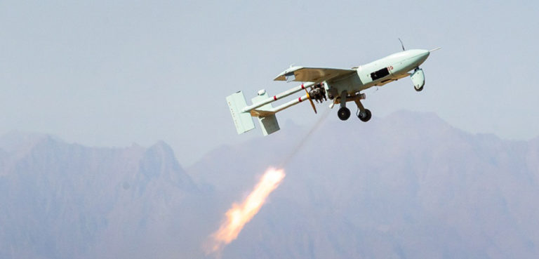 A drone test in Iran; cc Saeed Sajjadi, modified, https://fi.wikipedia.org/wiki/Tiedosto:Iranian_drone_exercise_in_2022_-_Day_2_%2820%29.jpg