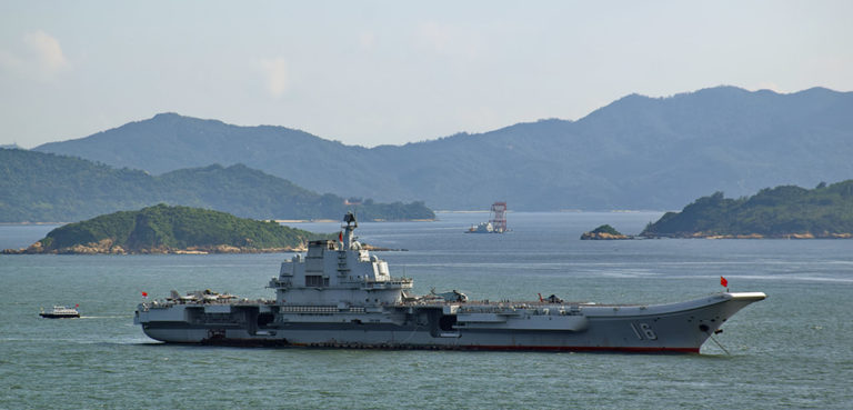 cc Baycrest, modified; the PLA Navy's Liaoning aircraft carrier off the coast of Hong Kong; https://en.m.wikipedia.org/wiki/File:Aircraft_Carrier_Liaoning_CV-16.jpg