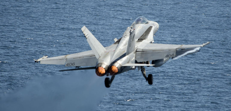 NORTH ARABIAN SEA (March 24, 2013) An F/A-18C Hornet from the Wildcats of Strike Fighter Squadron (VFA) 131 launches from the flight deck of the aircraft carrier USS Dwight D. Eisenhower (CVN 69) on the ship’s first day of combat air sorties of 2013 in support of Operation Enduring Freedom. Dwight D. Eisenhower is deployed to the U.S. 5th Fleet area of responsibility promoting maritime security operations, theater security cooperation efforts and support missions as part of Operation Enduring Freedom. (U.S. Navy photo by Mass Communication Specialist Seaman Andrew Schneider/Released) 130324-N-XQ474-299