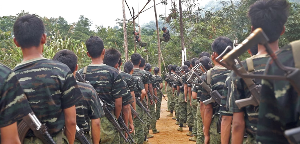 Footage of Arakan Army recruits training in 2024; cc VOA, modified, https://commons.wikimedia.org/w/index.php?search=arakan%20army&ns0=1&ns6=1&ns12=1&ns14=1&ns100=1&ns106=1#/media/File:Arakan_Army_Training.jpg