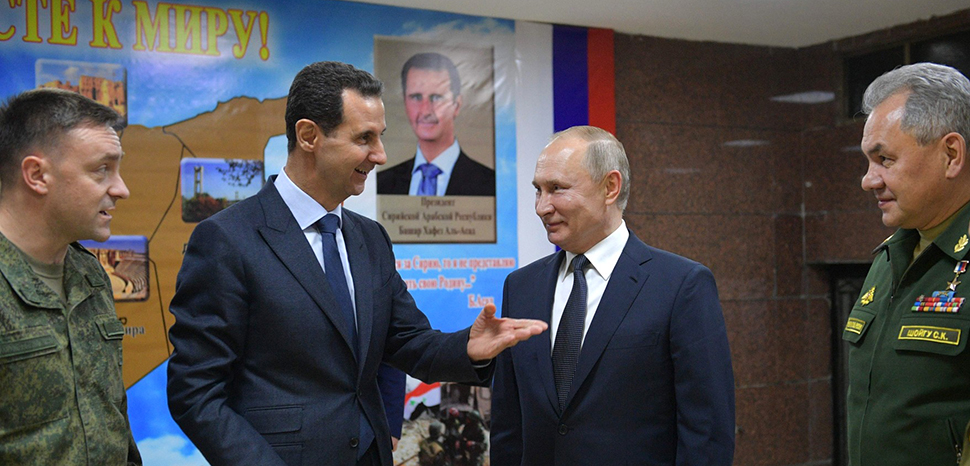 cc Kremlin.ru, modified, Putin on trip to Syria in 2020; https://commons.wikimedia.org/w/index.php?title=Special:Search&limit=500&offset=0&ns0=1&ns6=1&ns12=1&ns14=1&ns100=1&ns106=1&sort=last_edit_desc&search=assad+russia+filetype%3Abitmap&sort=last_edit_desc&advancedSearch-current={%22fields%22:{%22filetype%22:%22bitmap%22}}#/media/File:Vladimir_Putin_in_Syria_(2020-01-07)_01.jpg